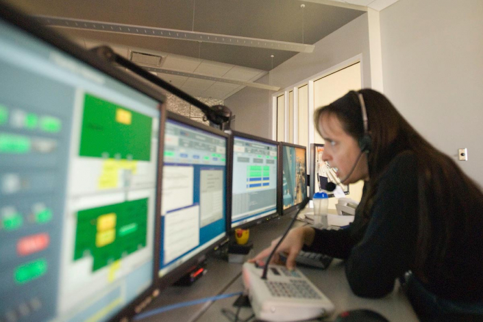 Control Room Diana Coppenberger making announcements in the OMEGA EP control room