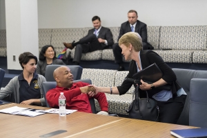 Carl Heastie is greeted by Sarah C. Mangelsdorf