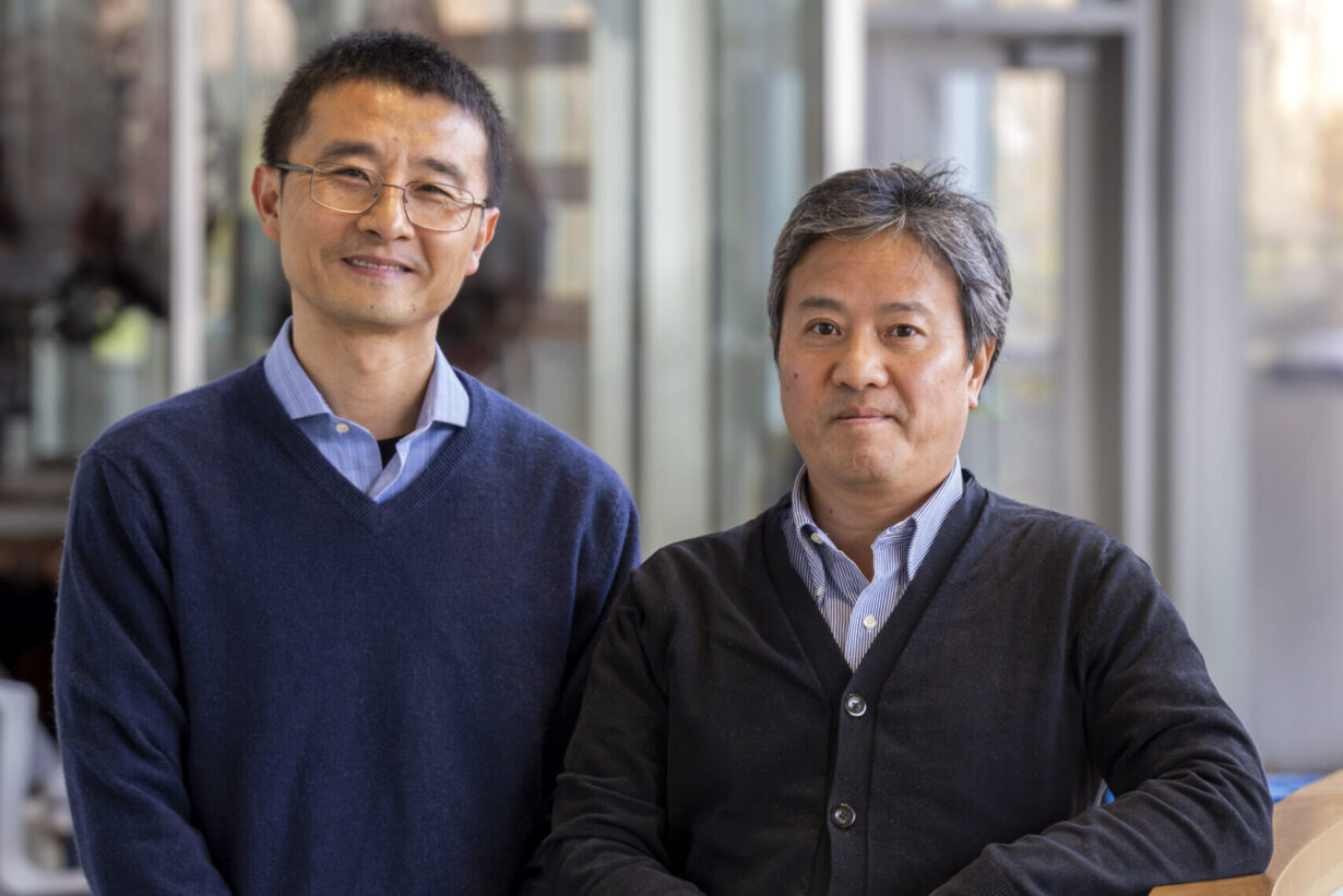 Two people standing next to each other.