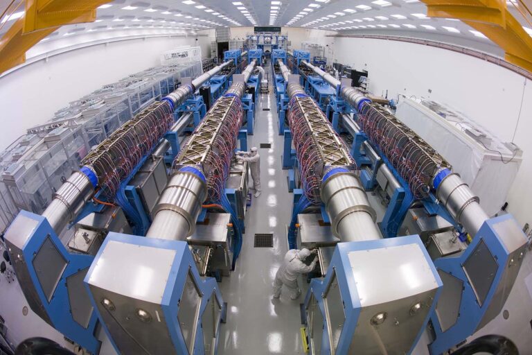 Room with metallic scientific equipment.