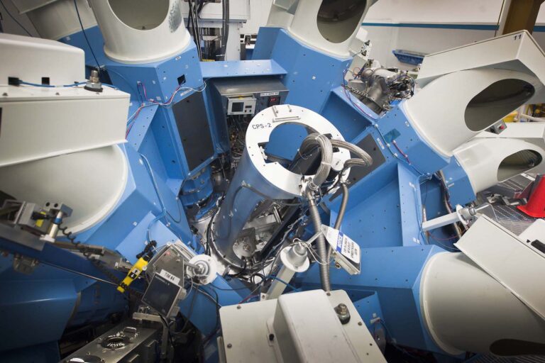 Photo taken from above the OMEGA Target Bay shows a spectrometer nestled next to laser beamlines.