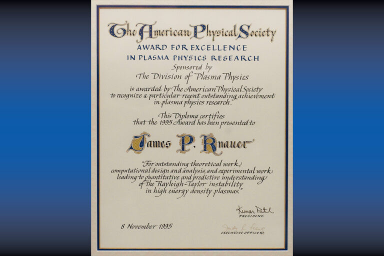 An image of the American Physical Society Award that was presented to James P. Knauer on November 8, 1995.