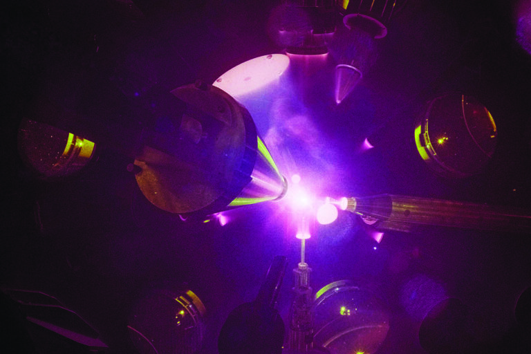 Photo taken from inside laser target chamber as laser beams hit target.